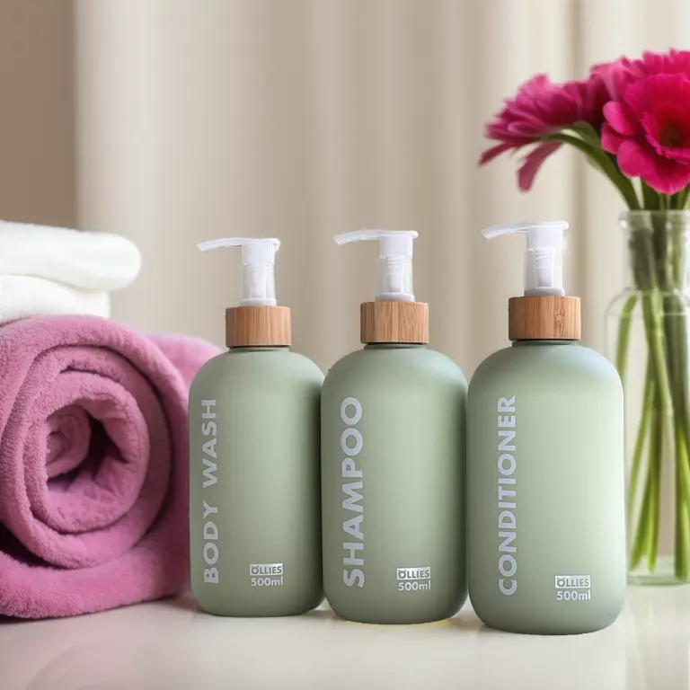 shampoo bottles, towel and flower in the background